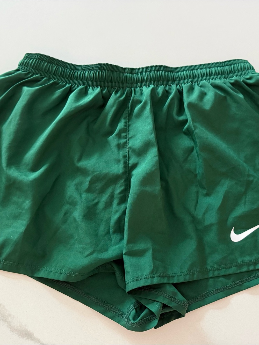 Nike Women's Emerald Green Athletic Shorts with White Swoosh